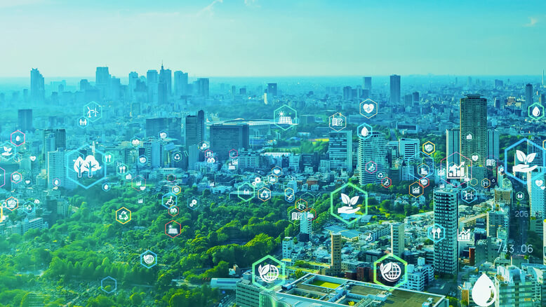 Uma vista de uma cidade inteligente inteira com hologramas de dados sendo atualizados em tempo real