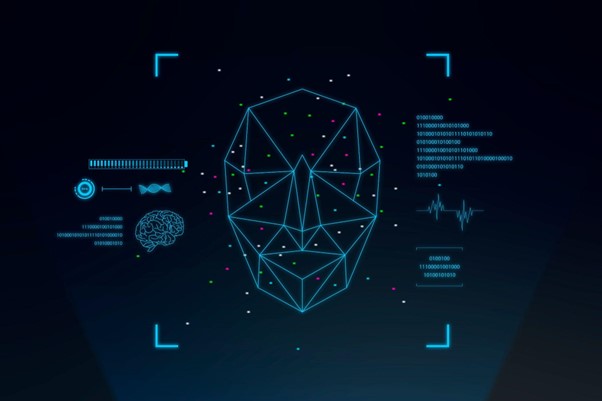 Diagrama digital de um rosto humano composto por linhas e pontos, exibido em um fundo escuro. Ao redor do rosto, há vários elementos gráficos e digitais, incluindo ícones de um cérebro, um gráfico de batimentos cardíacos e sequências binárias, representando a tecnologia de deepfake.